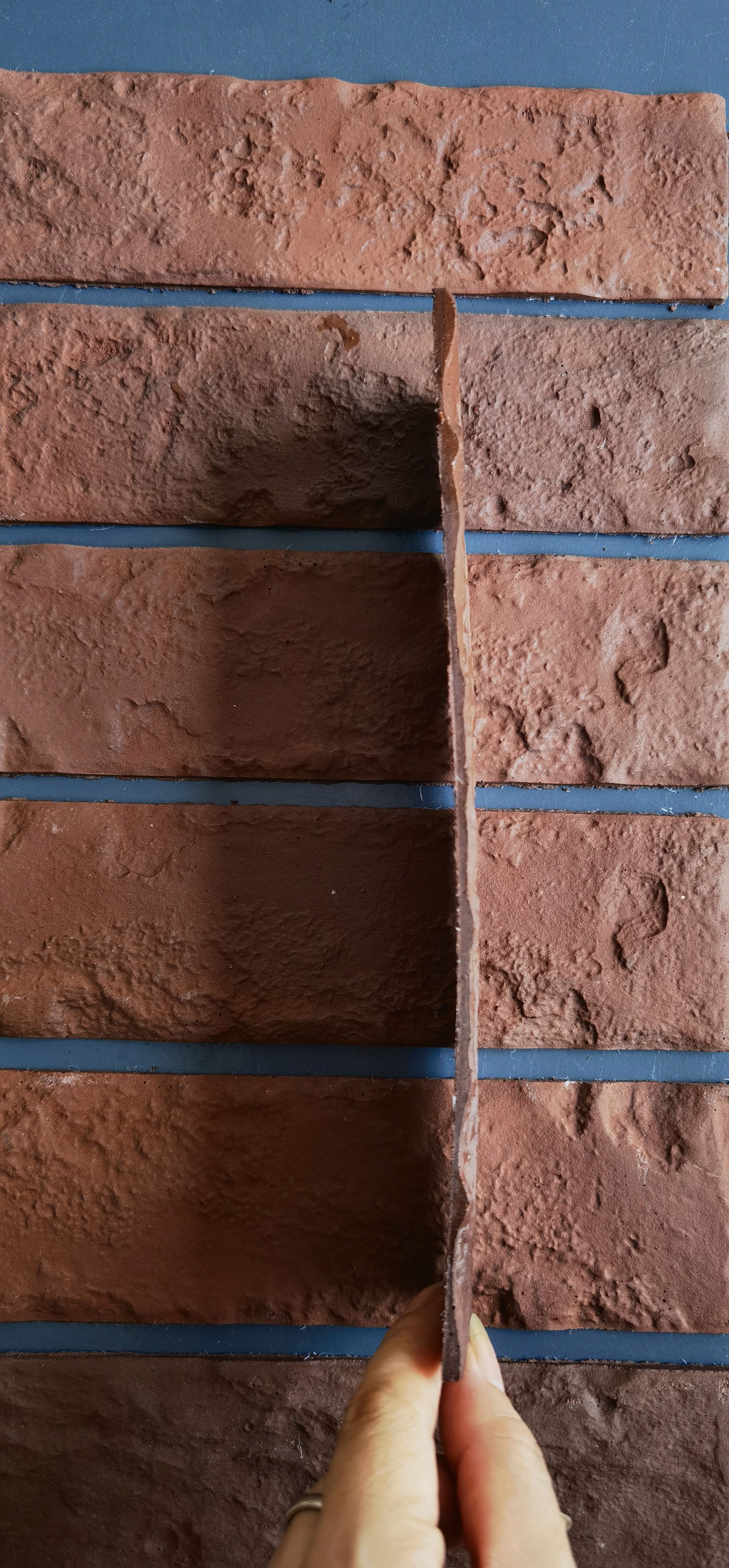 Modified Composite Material (MCM) with Faux Red Brick Effect for Exterior Wall Decoration.