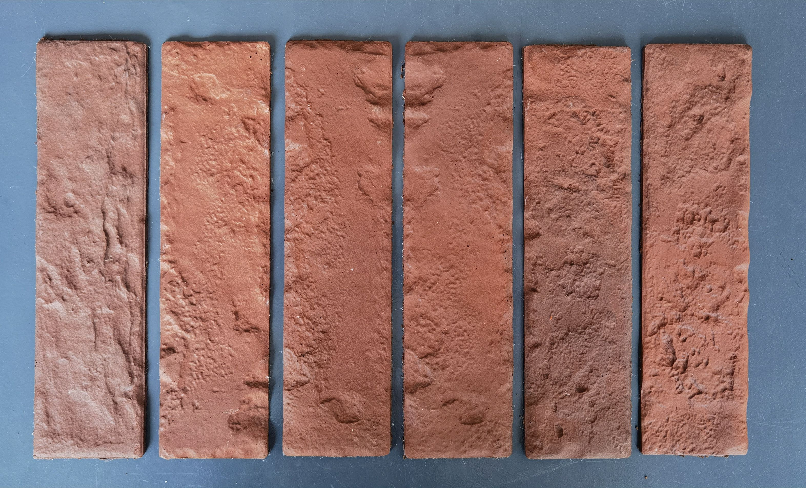 Modified Composite Material (MCM) with Faux Red Brick Effect for Exterior Wall Decoration.